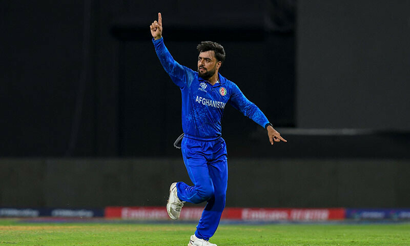 Rashid Khan celebrating after taking a wicket for Afghanistan