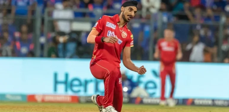 Arshdeep Singh celebrating after taking a wicket in the IPL for Punjab Kings
