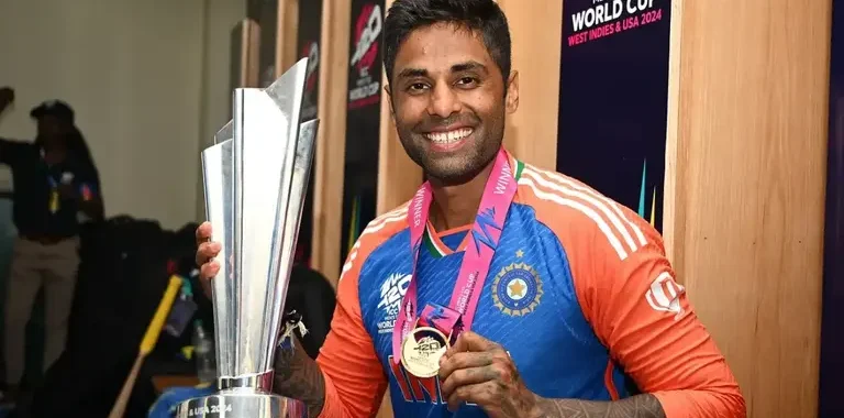 Suryakumar Yadav with the 2024 T20 World Cup trophy and winner's medal