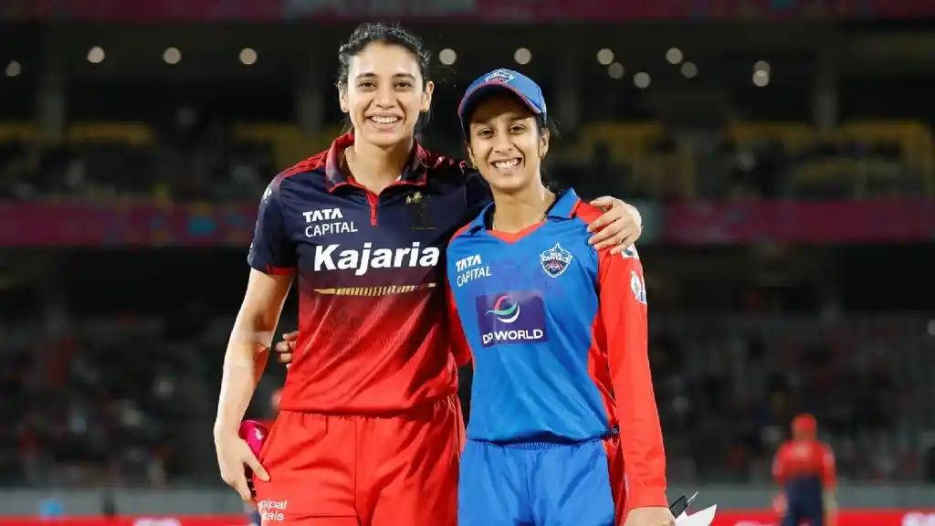 RCB captain Smriti Mandhana and Delhi Capitals captain Jemimah Rodrigues pose for a photo during WPL 2026