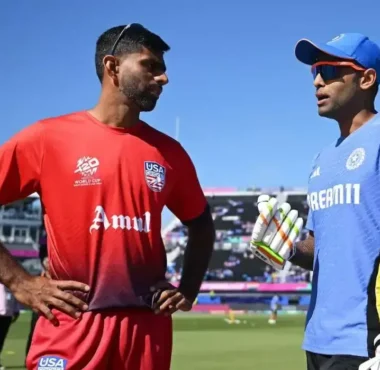 Saurabh Netravalkar and Suryakumar Yadav catch up before the USA vs India match during the 2024 T20 World Cup